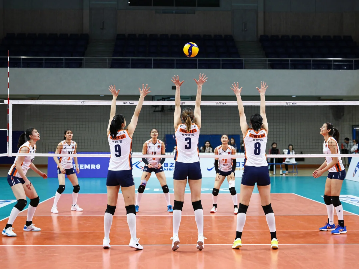 Volleyball players in a set and attack sequence on an indoor cour